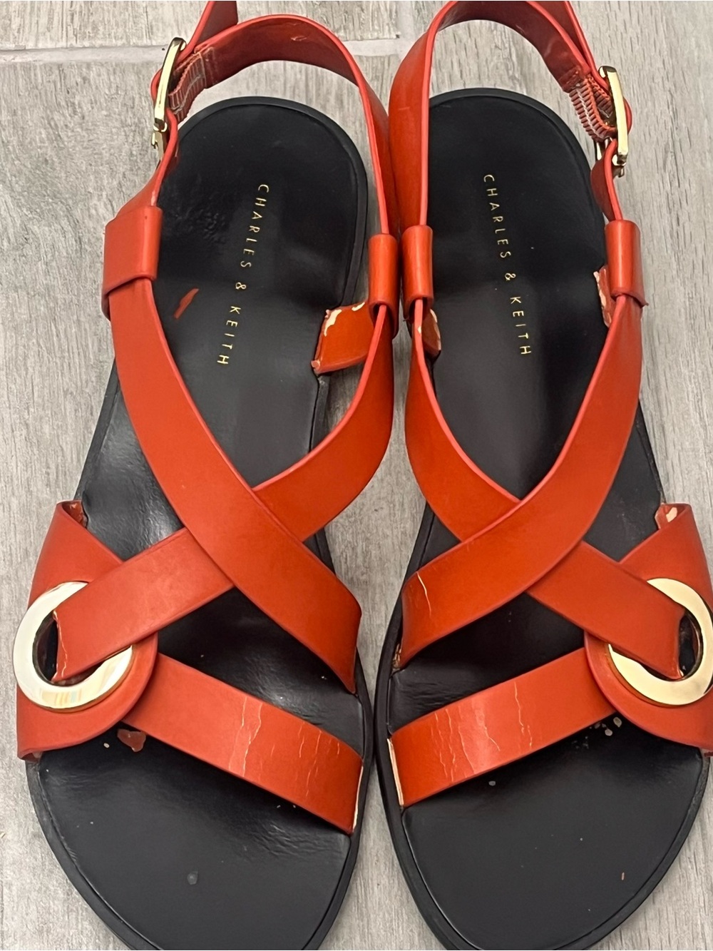 Charles & Keith Orange Crisscross Strap Flat Sandals with Gold Accents size 39
